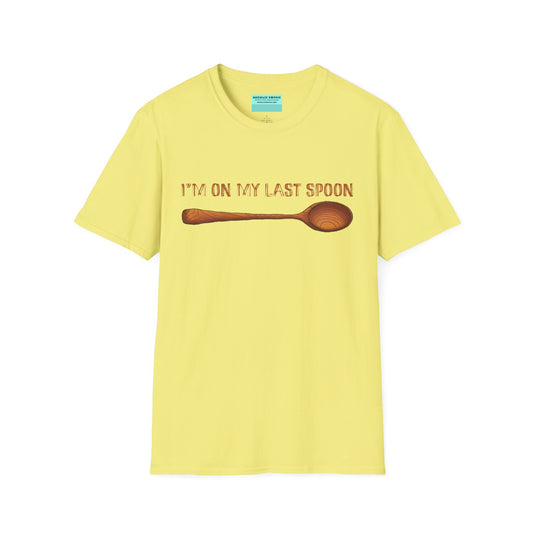 Yellow t-shirt with an illustration of a wooden spoon and the phrase 'I'm on my last spoon' printed on the front.