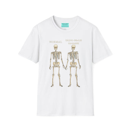 White unisex short sleeve t-shirt featuring two skeletons side by side—one labeled "normal," the other "Ehlers-Danlos Syndrome"—because connective tissue disorders deserve more visibility (and maybe a sense of humor, too).
