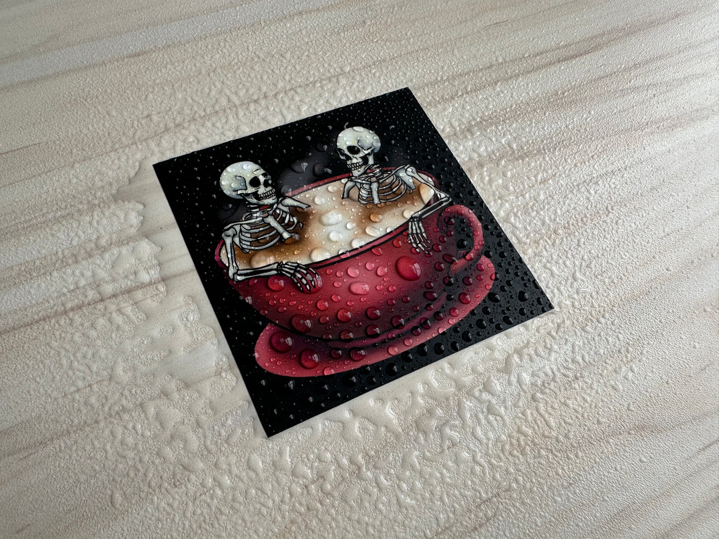 Spooky Skeletons in Coffee Cup Sticker, Gothic Halloween Skeletons Hot-Tubbing in a Cup of Coffee
