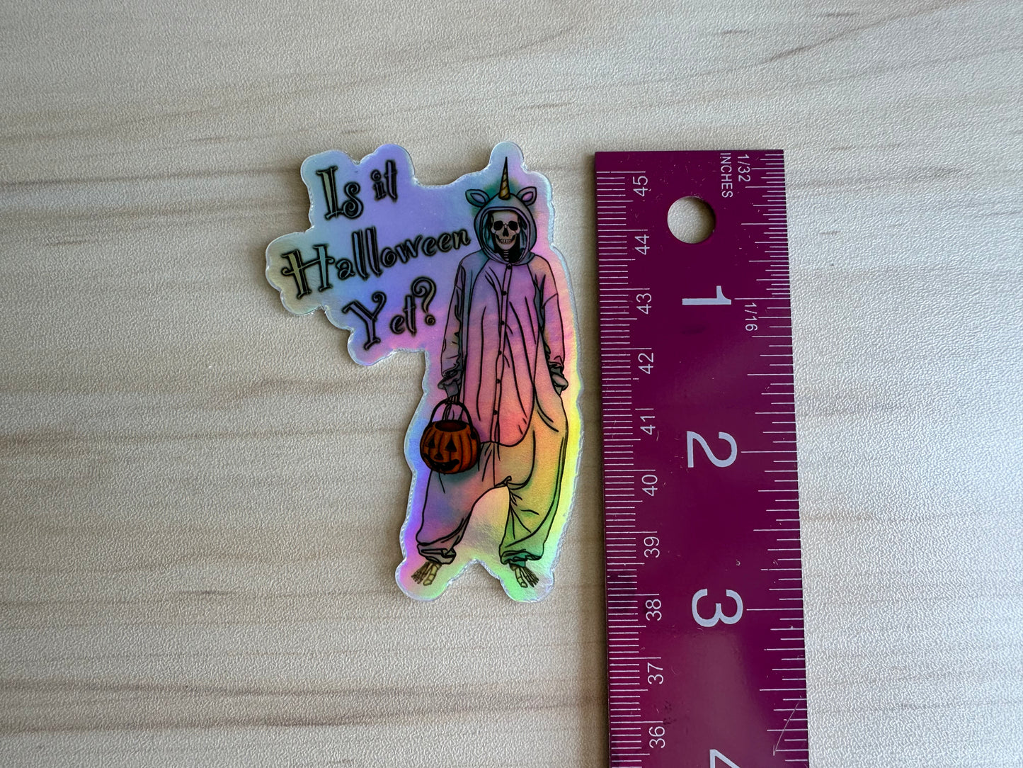 Holographic Halloween Skeleton Sticker, Skeleton in a Unicorn Costume, ‘Is it Halloween yet’ Vinyl Decal