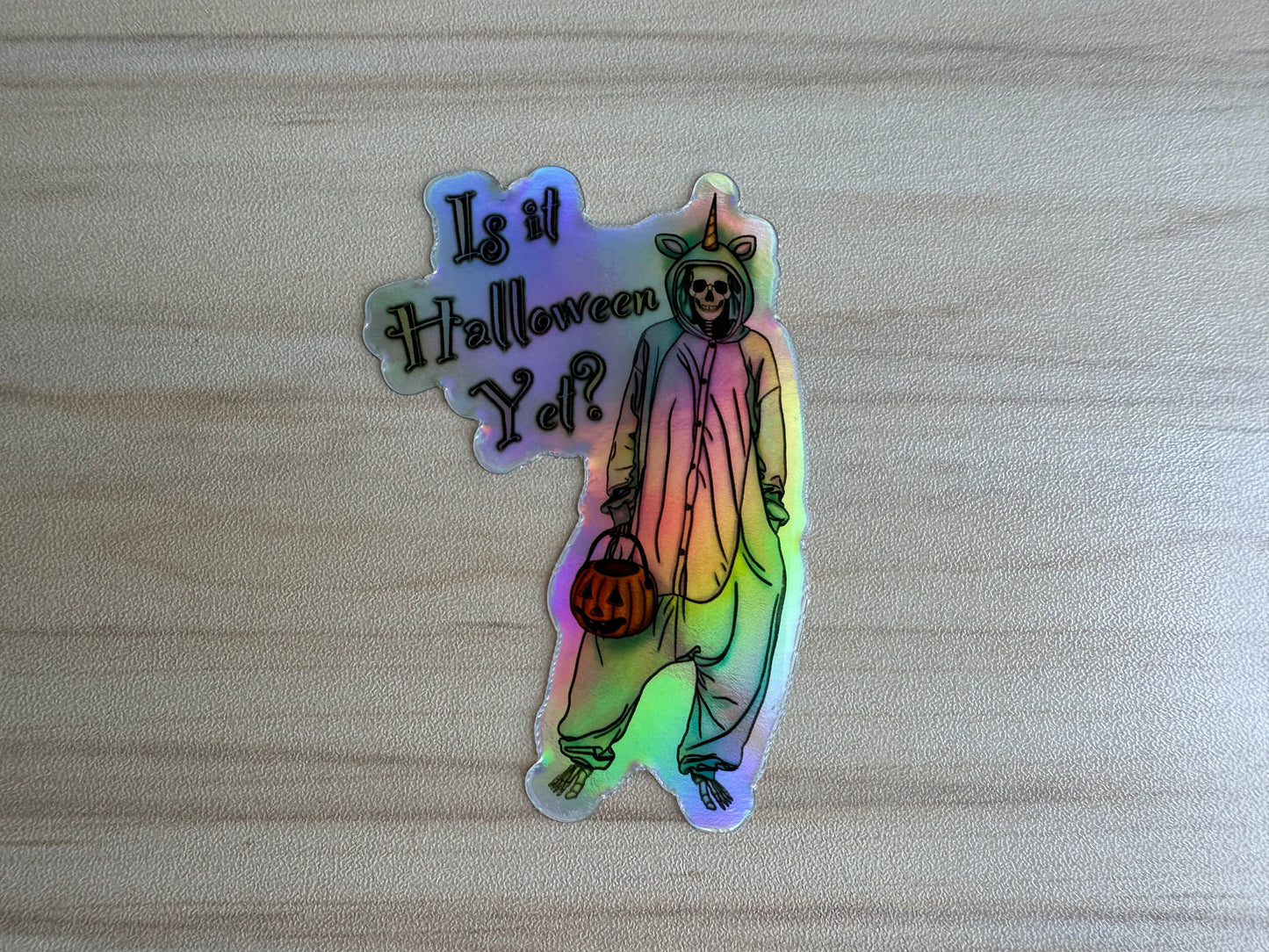 Holographic Halloween Skeleton Sticker, Skeleton in a Unicorn Costume, ‘Is it Halloween yet’ Vinyl Decal