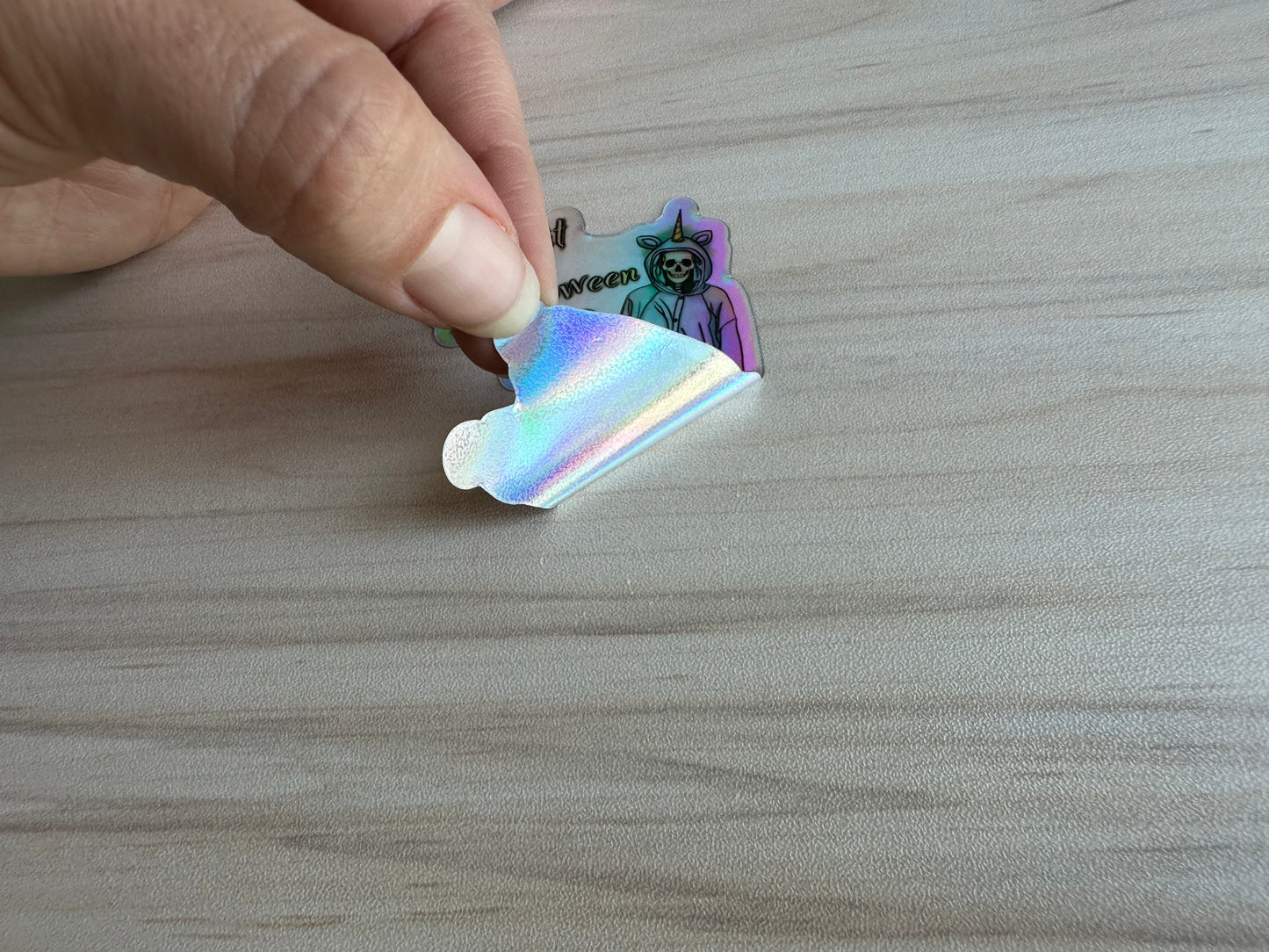 Holographic Halloween Skeleton Sticker, Skeleton in a Unicorn Costume, ‘Is it Halloween yet’ Vinyl Decal