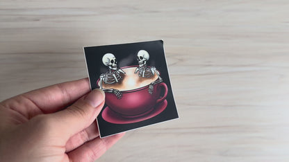 Spooky Skeletons in Coffee Cup Sticker, Gothic Halloween Skeletons Hot-Tubbing in a Cup of Coffee